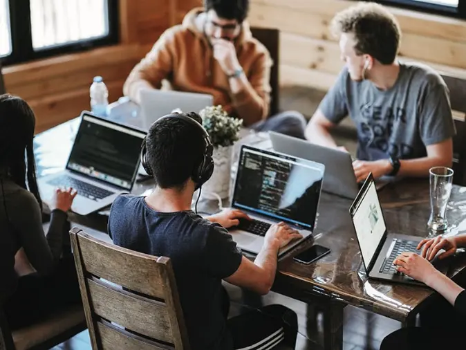 Group of students working together at table