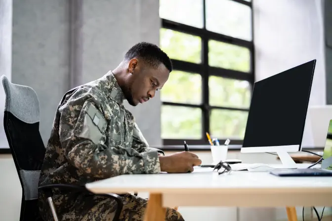 veteran soldier working at table