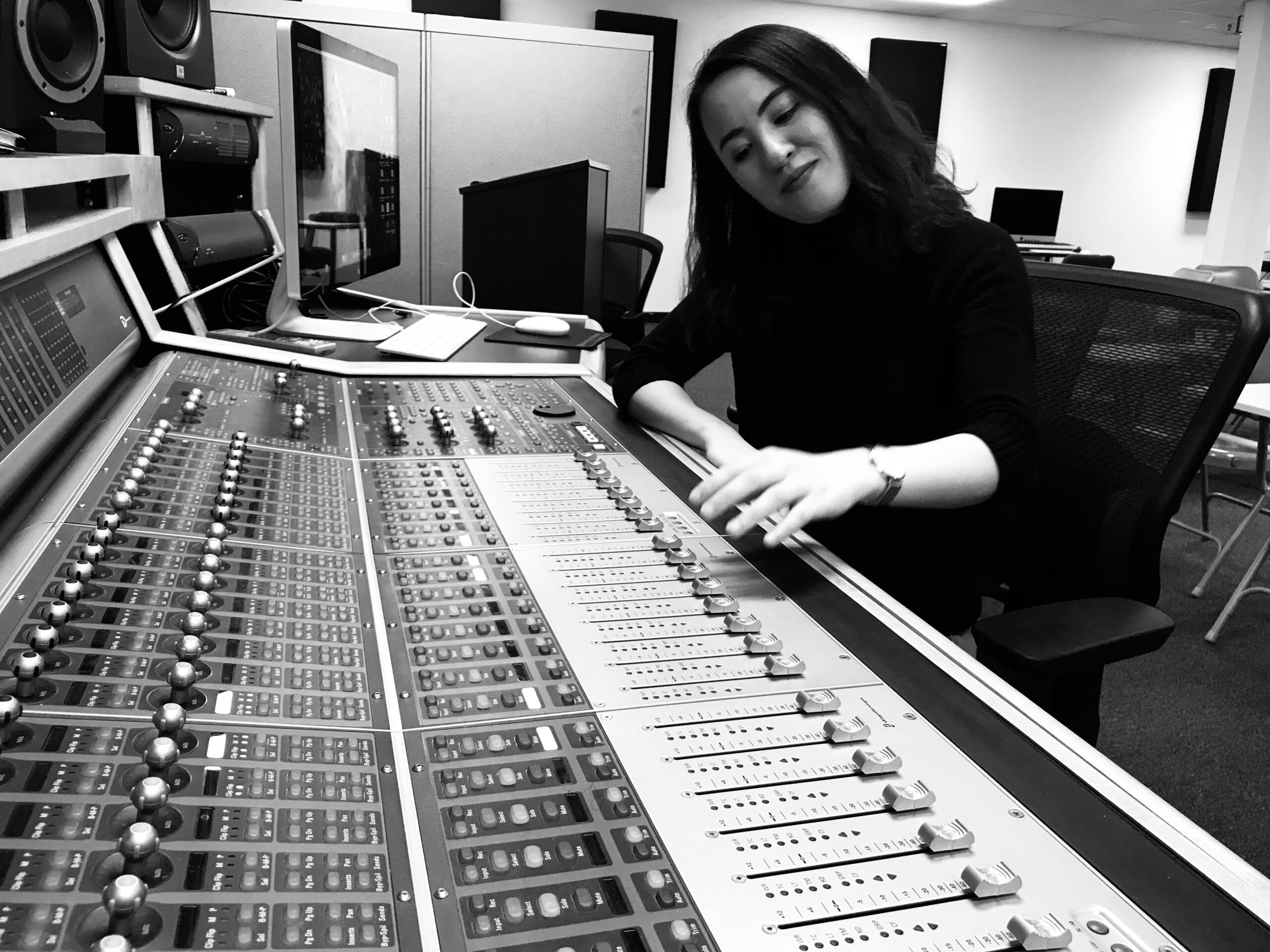 Hannah Hsieh working on music production in her music producing program.